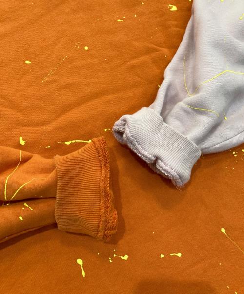 MUSIC SAVED MY LIFE（ミュージック セイブ マイ ライフ）MUSIC SAVED MY LIFE (ミュージック セイブ マイ ライフ) ペイントバイカラースウェット　M101-02L5-CL51 オレンジ サイズ:Lの古着・服飾アイテム