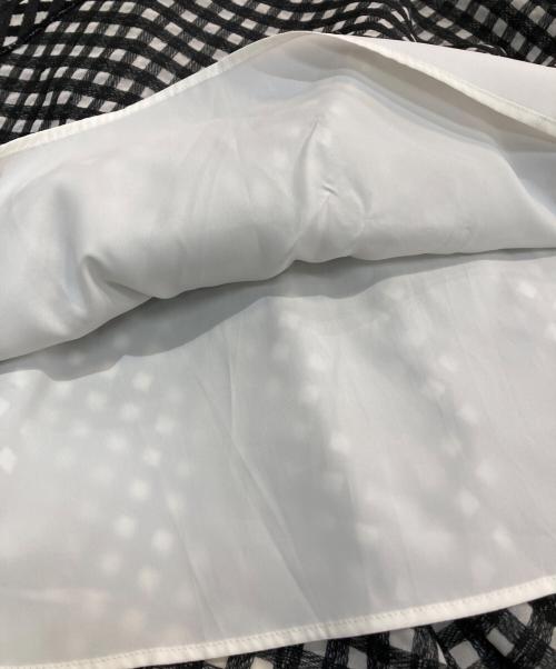 M-premierBLACK（エムプルミエブラック）M-premierBLACK (エムプルミエブラック) ギンガムチェックサーキュラースカート ホワイト×ブラック サイズ:34の古着・服飾アイテム