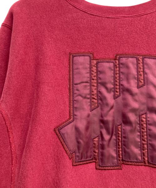 Champion REVERSE WEAVE（チャンピオン リバース ウィーブ）Champion REVERSE WEAVE (チャンピオン リバース ウィーブ) UNDEFEATED (アンディフィーテッド) 5 STRIKE CREW SWEAT ボルドー サイズ:Mの古着・服飾アイテム