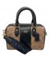 COACH（コーチ）の古着「ミニ ローアン クロスボディ・シグネチャー キャンバス・ストライプ」｜ブラウン×ブラック