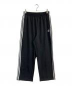 adidasアディダス）の古着「アディカラー バギーフィット ファイヤーバードトラックパンツ　IZ4801」｜ブラック