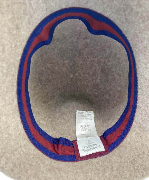 Vivienne Westwood（ヴィヴィアンウエストウッド）Vivienne Westwood (ヴィヴィアンウエストウッド) ORB刺繍 バスククロッシェ ベージュの古着・服飾アイテム