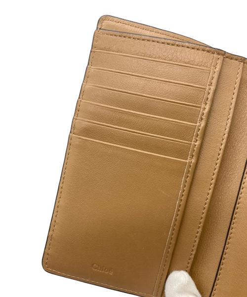 Chloe（クロエ）Chloe (クロエ) チャーム付き 3つ折り財布 ブラウンの古着・服飾アイテム