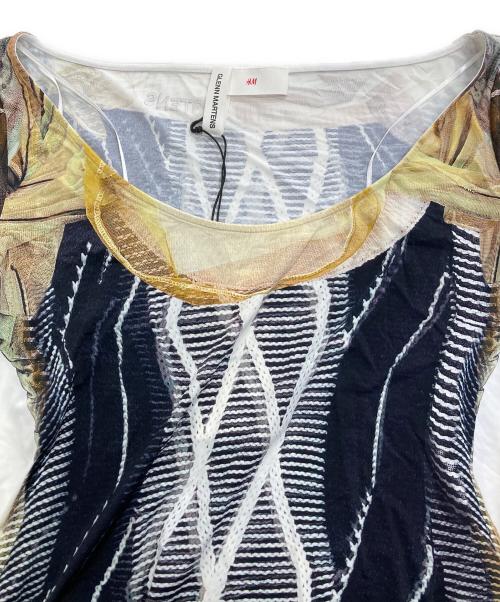 H&M（エイチアンドエム）H&M (エイチアンドエム) GLENN MARTENS (グレンマーティンス) 総柄プリントトップス ホワイト×ブラック サイズ:L 未使用品の古着・服飾アイテム