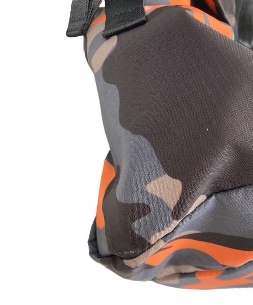 DSQUARED2（ディースクエアード）DSQUARED2 (ディースクエアード) CERESIO 9 CAMO BIG BACKPACK オレンジ×グレーの古着・服飾アイテム