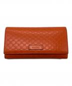 GUCCIグッチ）の古着「長財布」｜オレンジ