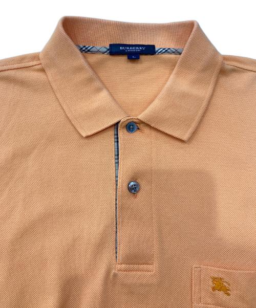 BURBERRY（バーバリー）BURBERRY (バーバリー) ポロシャツ オレンジ サイズ:Lの古着・服飾アイテム