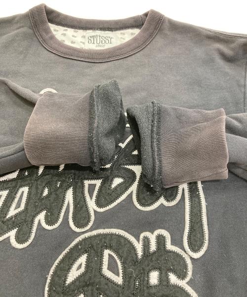 stussy（ステューシー）stussy (ステューシー) ワッペンクルーネックスウェット ブラック サイズ:Lの古着・服飾アイテム