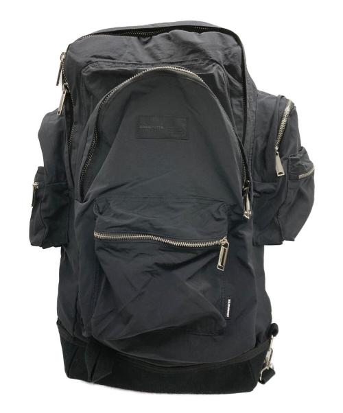 ADAM PATEK（アダムパテック）ADAM PATEK (アダムパテック) sticky pockets BIG backpack ブラックの古着・服飾アイテム