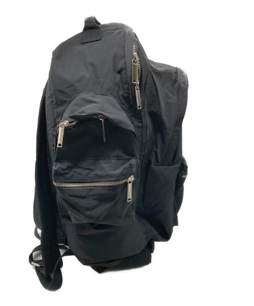 ADAM PATEK（アダムパテック）ADAM PATEK (アダムパテック) sticky pockets BIG backpack ブラックの古着・服飾アイテム