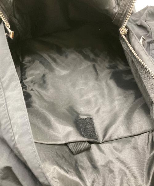ADAM PATEK（アダムパテック）ADAM PATEK (アダムパテック) sticky pockets BIG backpack ブラックの古着・服飾アイテム