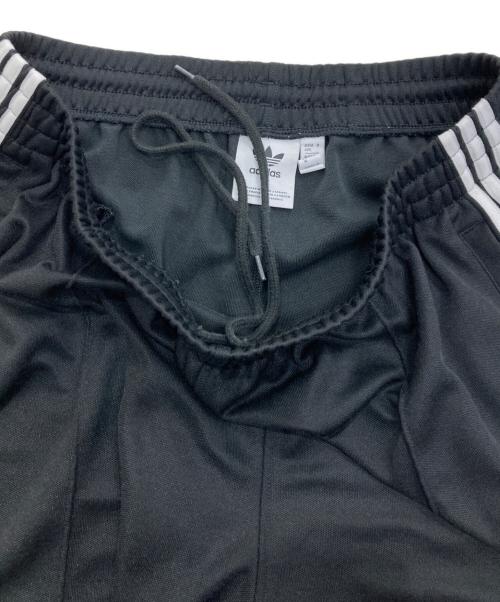 adidas Originals（アディダスオリジナル）adidas originals (アディダスオリジナル) アディカラーバギーフィットファイヤーバードトラックパンツ ブラック サイズ:2XLの古着・服飾アイテム