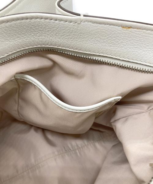 TOD'S（トッズ）TOD'S (トッズ) スタッズフラワートートバッグの古着・服飾アイテム