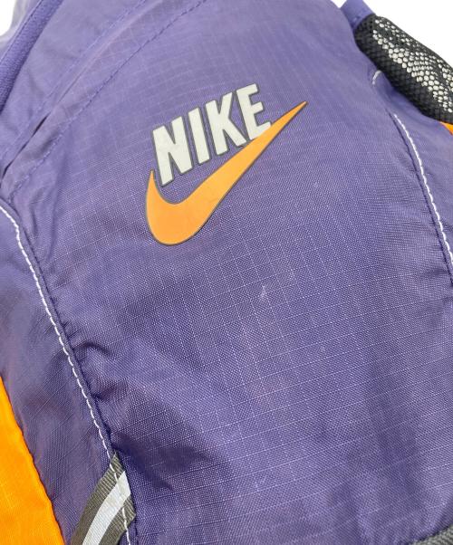 NIKE（ナイキ）NIKE (ナイキ) スリングバッグ パープル×オレンジの古着・服飾アイテム