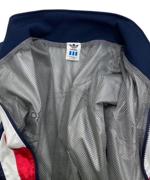 adidas（アディダス）adidas (アディダス) ナイロンジップジャケット ホワイト サイズ:Ｌの古着・服飾アイテム