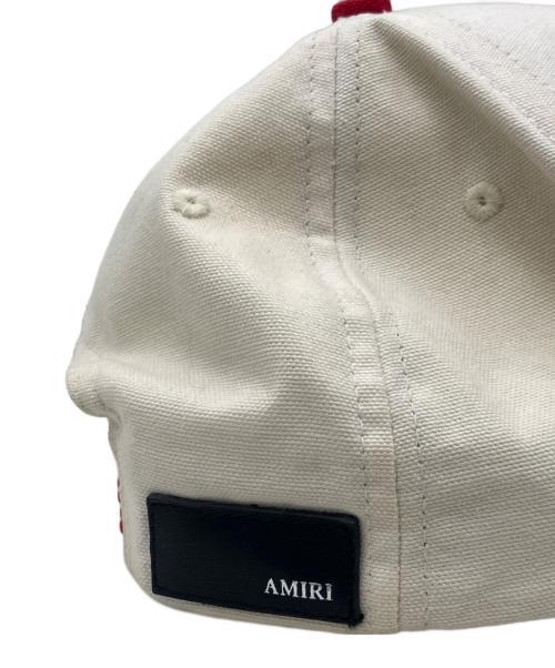 AMIRI（アミリ）AMIRI (アミリ) キャップ アイボリー×レッドの古着・服飾アイテム