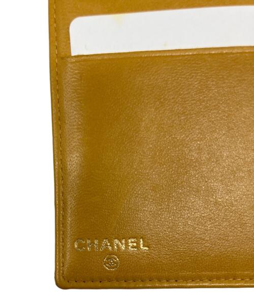 CHANEL（シャネル）CHANEL (シャネル) ココマーク 二つ折がま口長財布 イエローの古着・服飾アイテム