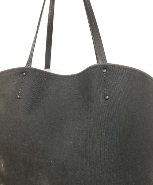 PRADA（プラダ）PRADA (プラダ) 恐竜モチーフトートバッグ ブラック・レッドの古着・服飾アイテム
