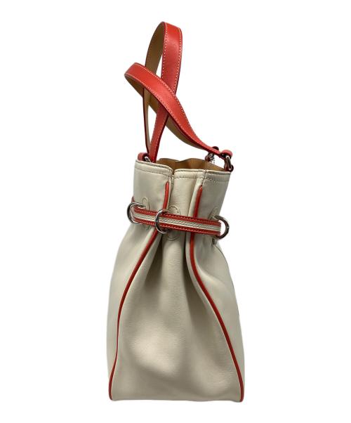 COACH（コーチ）COACH (コーチ) レザーバイカラートートバッグ アイボリー×オレンジの古着・服飾アイテム