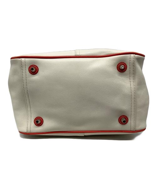 COACH（コーチ）COACH (コーチ) レザーバイカラートートバッグ アイボリー×オレンジの古着・服飾アイテム
