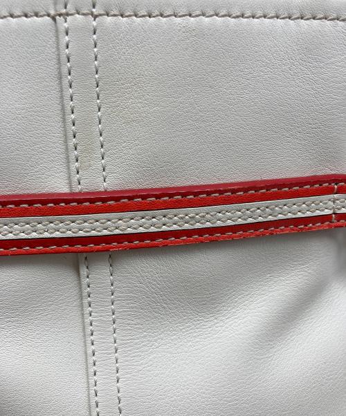 COACH（コーチ）COACH (コーチ) レザーバイカラートートバッグ アイボリー×オレンジの古着・服飾アイテム