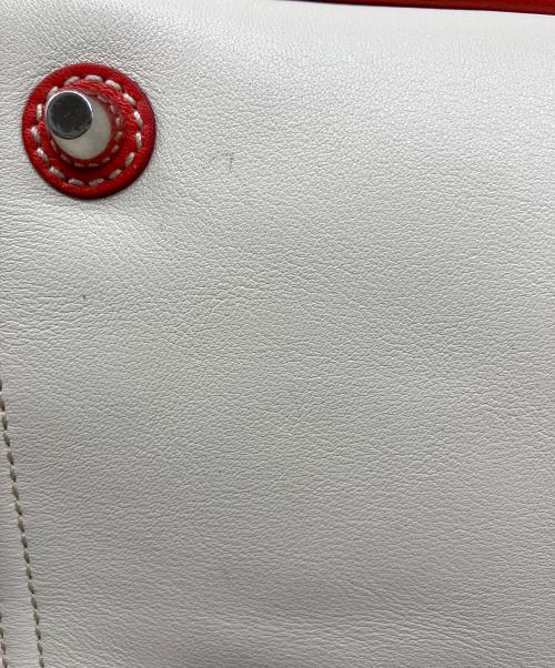 COACH（コーチ）COACH (コーチ) レザーバイカラートートバッグ アイボリー×オレンジの古着・服飾アイテム