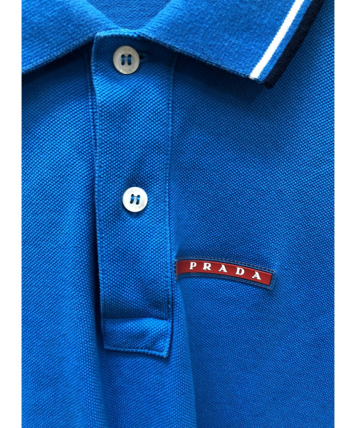 PRADA（プラダ）PRADA (プラダ) ポロシャツ ブルー サイズ:SIZE Lの古着・服飾アイテム