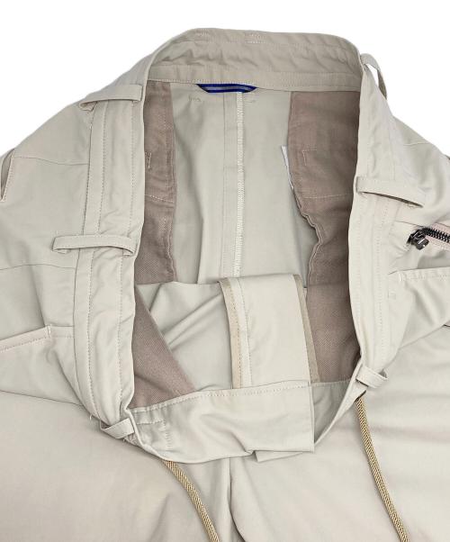 Junhashimoto（ジュンハシモト）Junhashimoto (ジュンハシモト) EASY TUCK PANTS 2WAY NYLON STRETCH/イージータックパンツナイロン ストレッチ アイボリー サイズ:3の古着・服飾アイテム