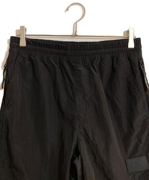 Calvin Klein Jeans（カルバンクラインジーンズ）Calvin Klein Jeans (カルバンクラインジーンズ) リップストップナイロンパンツ ブラック サイズ:Sの古着・服飾アイテム