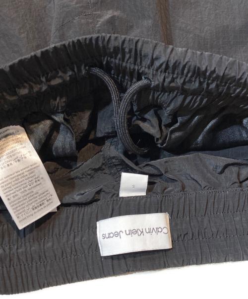 Calvin Klein Jeans（カルバンクラインジーンズ）Calvin Klein Jeans (カルバンクラインジーンズ) リップストップナイロンパンツ ブラック サイズ:Sの古着・服飾アイテム