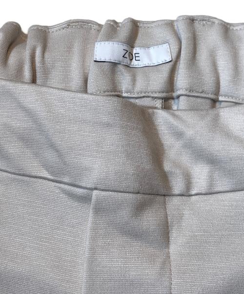 ZOE（ゾーイ）zoe (ゾーイ) フレアパンツ ベージュ サイズ:FREE 未使用品の古着・服飾アイテム