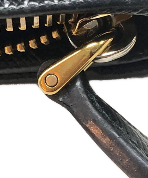 PRADA（プラダ）PRADA (プラダ) サフィアーノl字ファスナーコンパクトウォレット ブラックの古着・服飾アイテム