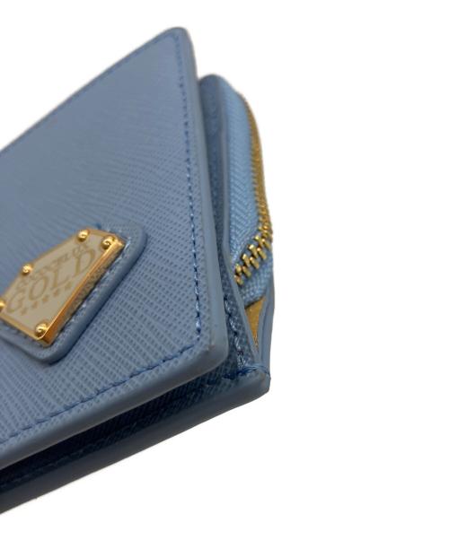 COCOCELUX GOLD（ココセリュックスゴールド）COCOCELUX GOLD (ココセリュックスゴールド) 2つ折り財布 スカイブルーの古着・服飾アイテム