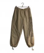 SUPREMEシュプリーム）の古着「Spellout Embroidered Track pant/スペルアウト エンブロイダリー トラック パンツ」｜ベージュ