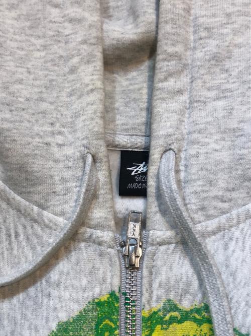 stussy（ステューシー）stussy (ステューシー) グラフィック ジップアップ パーカー グレー サイズ:Ｓの古着・服飾アイテム