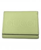 GUCCIグッチ）の古着「エンボスロゴミニウォレット」｜グリーン