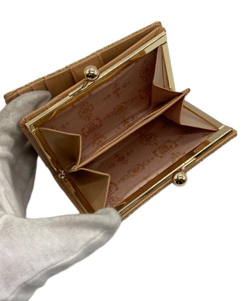 ANNA SUI（アナスイ）ANNA SUI (アナスイ) 2つ折り財布 イエローの古着・服飾アイテム