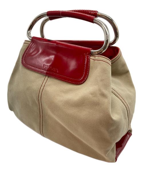 PRADA（プラダ）PRADA (プラダ) BEIGE CANVAS METAL LOOP TOTE BAG レッドの古着・服飾アイテム