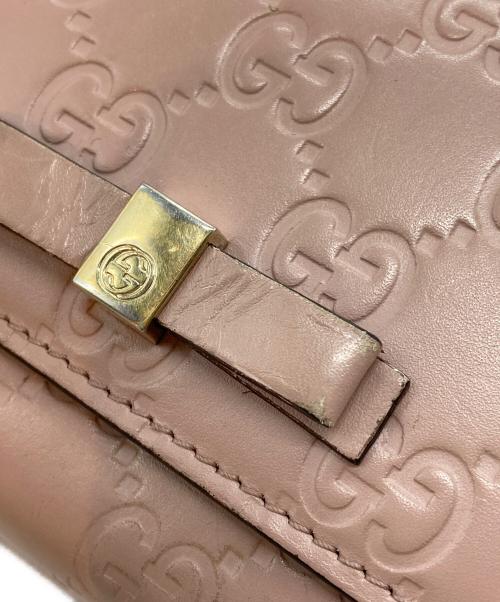 GUCCI（グッチ）GUCCI (グッチ) リボンフラップウォレット ピンクの古着・服飾アイテム