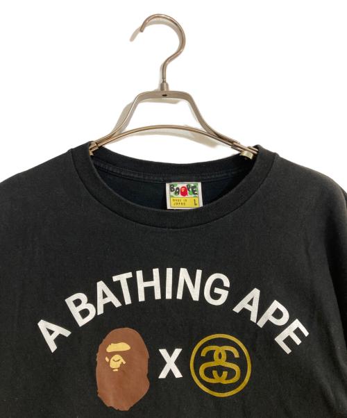 A BATHING APE（アベイシングエイプ）A BATHING APE (アベイシングエイプ) stussy (ステューシー) コラボロゴプリントTシャツ ブラック サイズ:Lの古着・服飾アイテム