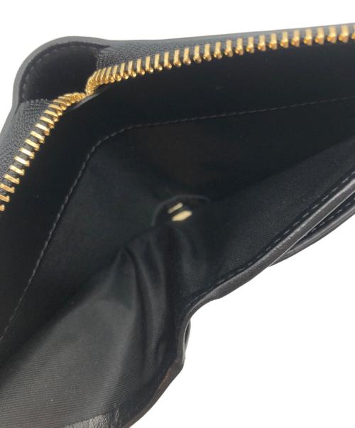 VERSACE（ヴェルサーチェ）VERSACE (ヴェルサーチェ) Ｖモチーフラウンドジップウォレット ピンクの古着・服飾アイテム