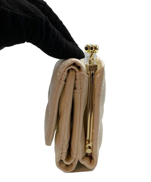 PAUL & JOE ACCESSOIRES（ポールアンドジョー アクセソワ）PAUL & JOE ACCESSOIRES (ポールアンドジョー アクセソワ) 2つ折り財布 ベージュの古着・服飾アイテム