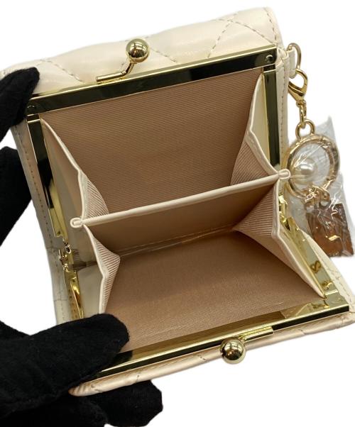 PAUL & JOE ACCESSOIRES（ポールアンドジョー アクセソワ）PAUL & JOE ACCESSOIRES (ポールアンドジョー アクセソワ) 2つ折り財布 ベージュの古着・服飾アイテム