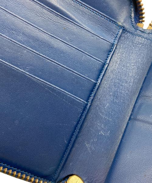 COMME des GARCONS（コムデギャルソン）COMME des GARCONS (コムデギャルソン) ラウンドファスナー財布 ブルーの古着・服飾アイテム