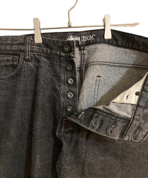 stussy（ステューシー）stussy (ステューシー) テーパードブラックデニムパンツ ブラック サイズ:SIZE 34の古着・服飾アイテム