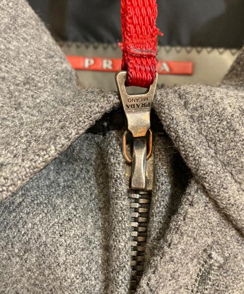 PRADA SPORTS（プラダスポーツ）PRADA SPORTS (プラダスポーツ) ナイロンパイピングウール混スイングトップ グレー サイズ:Sの古着・服飾アイテム