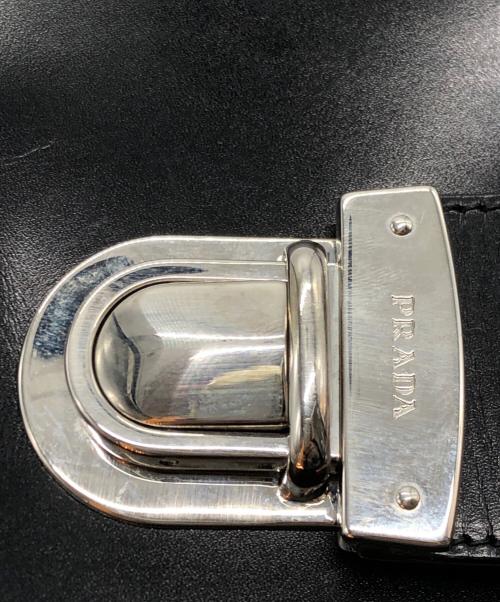 PRADA（プラダ）PRADA (プラダ) プッシュロックレザーワンショルダーバッグ ブラックの古着・服飾アイテム