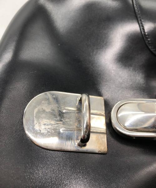 PRADA（プラダ）PRADA (プラダ) プッシュロックレザーワンショルダーバッグ ブラックの古着・服飾アイテム