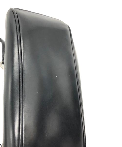 PRADA（プラダ）PRADA (プラダ) プッシュロックレザーワンショルダーバッグ ブラックの古着・服飾アイテム