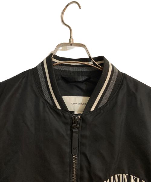 Calvin Klein（カルバンクライン）Calvin Klein (カルバンクライン) LS UNFILLED NYLON TIPPED GRAPHIC BOMBER MA-1 ブラック サイズ:Sの古着・服飾アイテム
